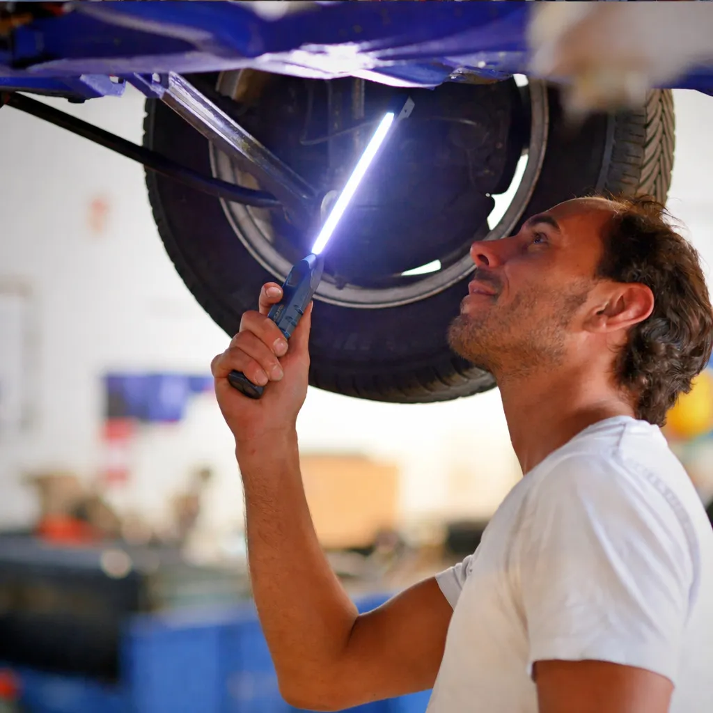 Mechanic working on car